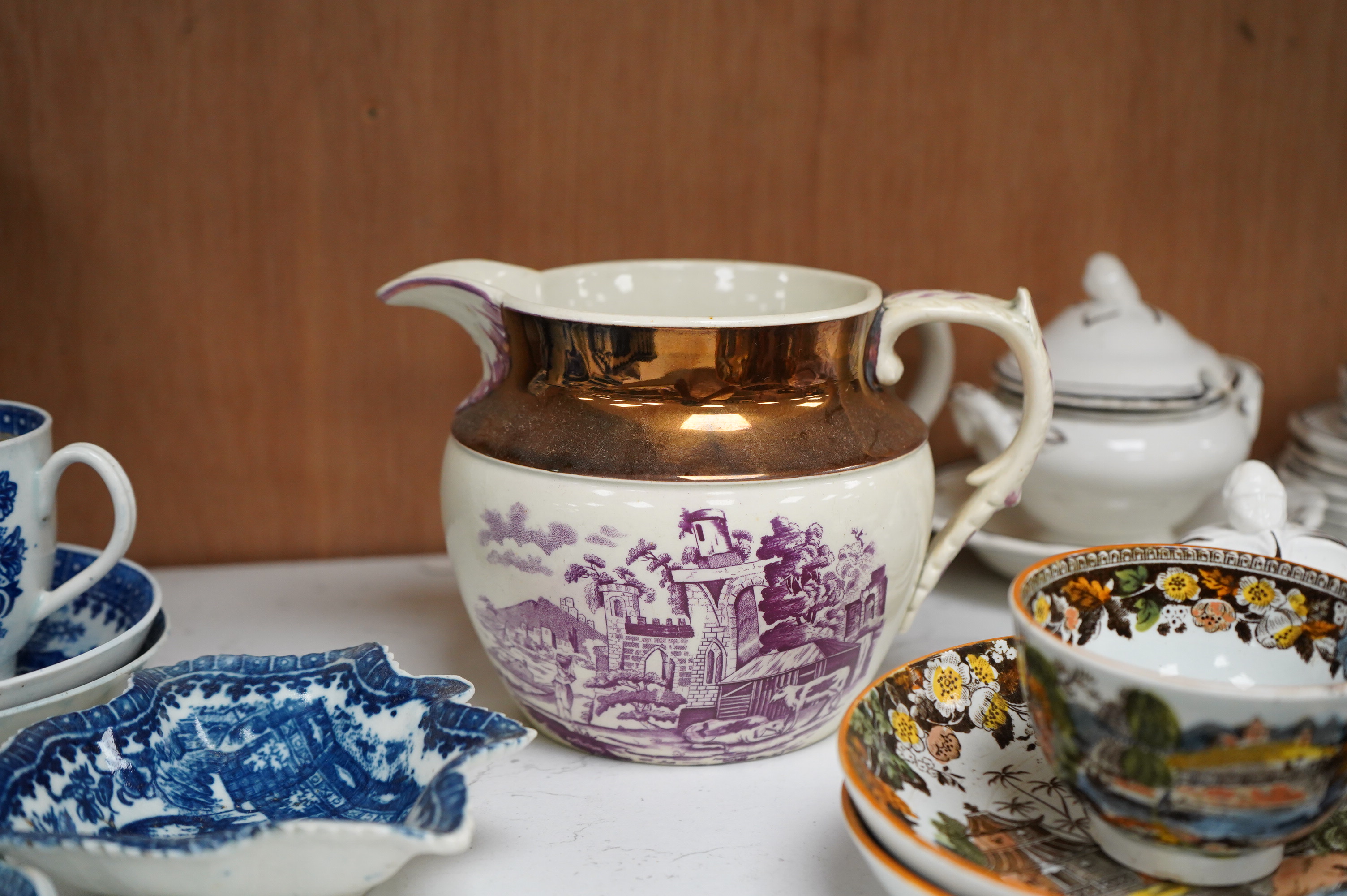A collection of early 19th century English blue and white pearlware leaf dishes, chestnut baskets, Victorian dolls house dinner service and other pottery